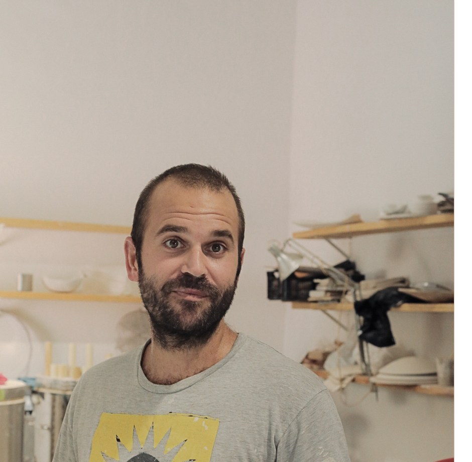Portrait of Henri Carrelet standing in his studio