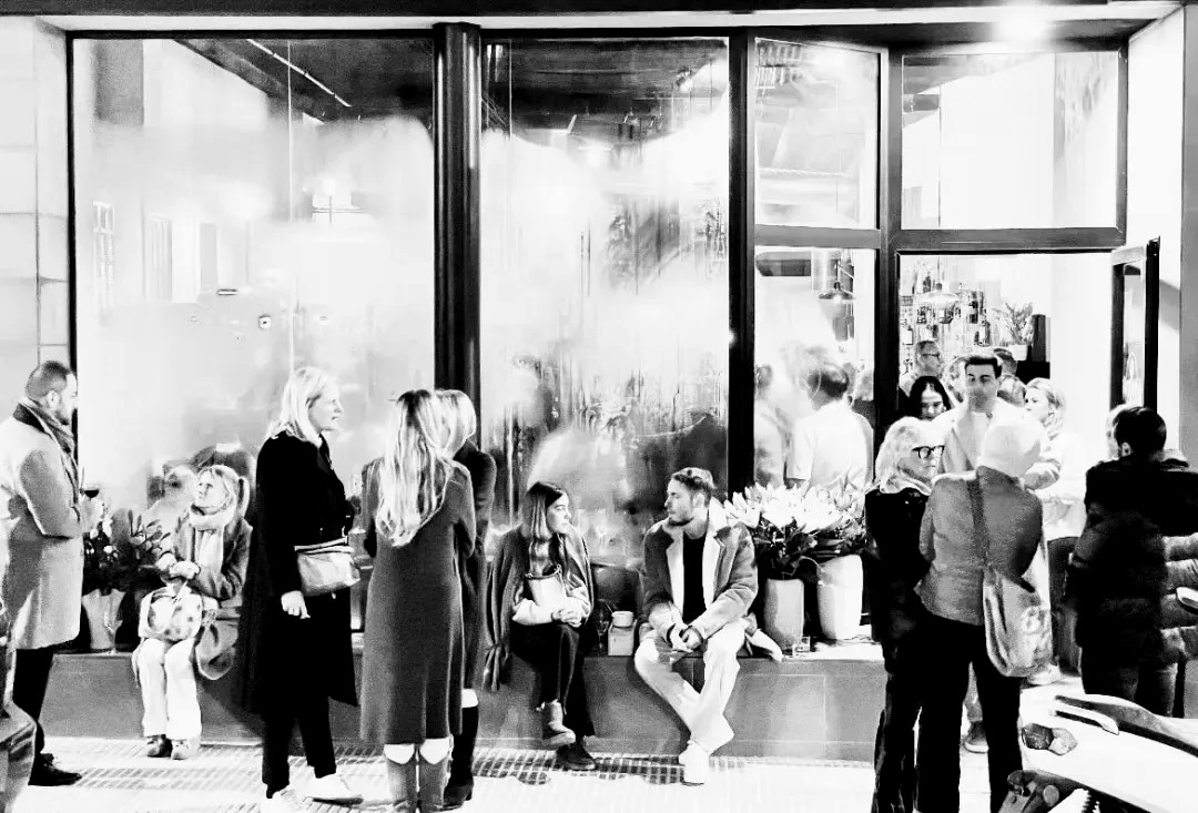 Guests gathered outside Pax Gastrobar in the evening